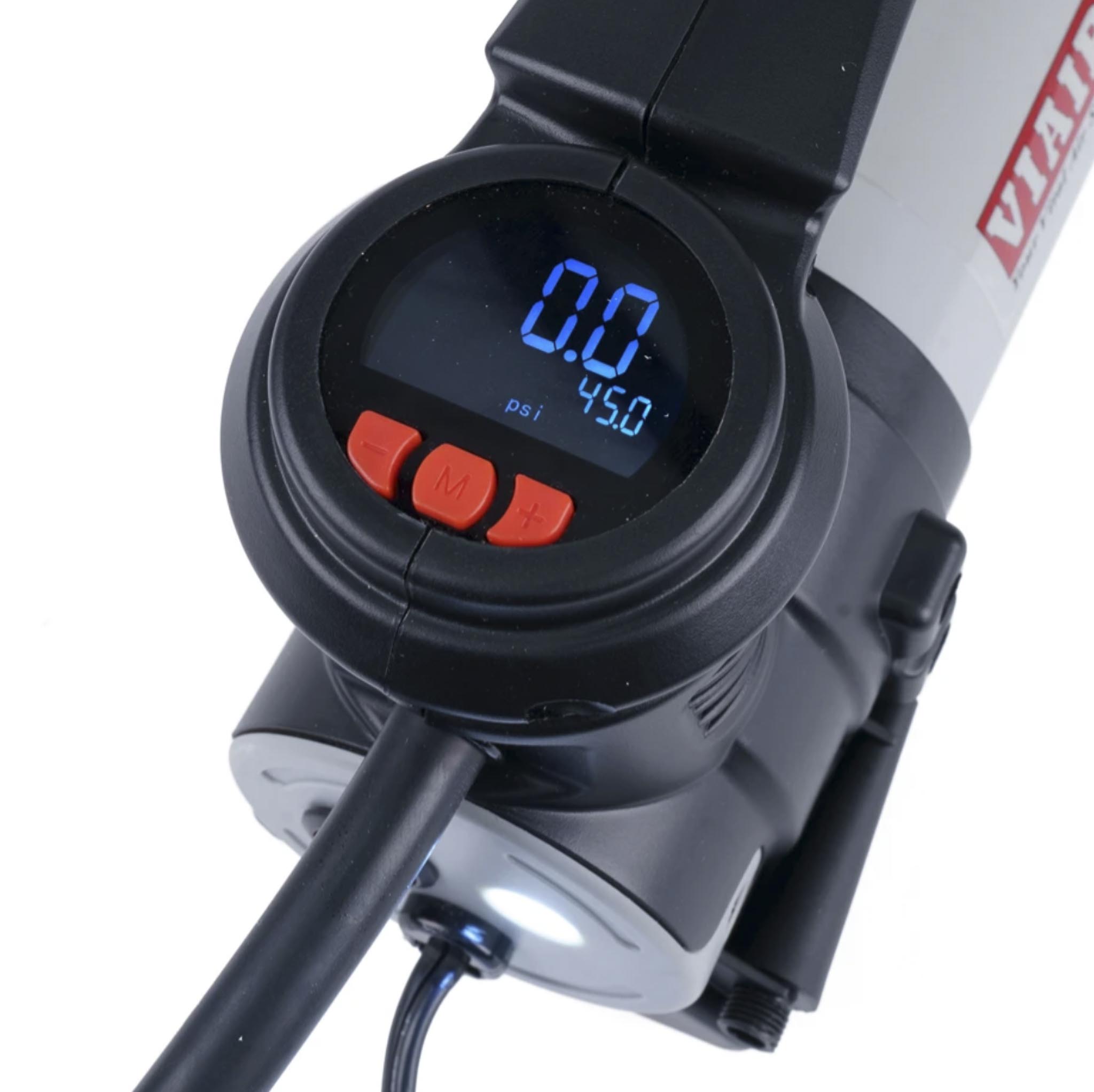Close-up of a digital pressure gauge displaying 0.0 psi on a black device handlebar (inflation tool).