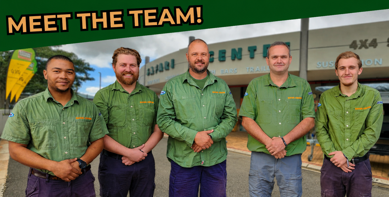 Five team members in green uniforms stand together outdoors under a bold 'MEET THE TEAM!' banner on a storefront backdrop.
