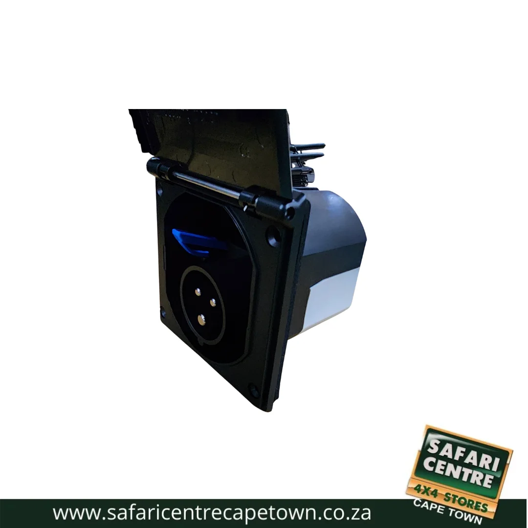 Black mounting plate with a circular multi-pin connector and blue LED indicator, an automotive accessory shown at an angle (Safari Centre branding visible).